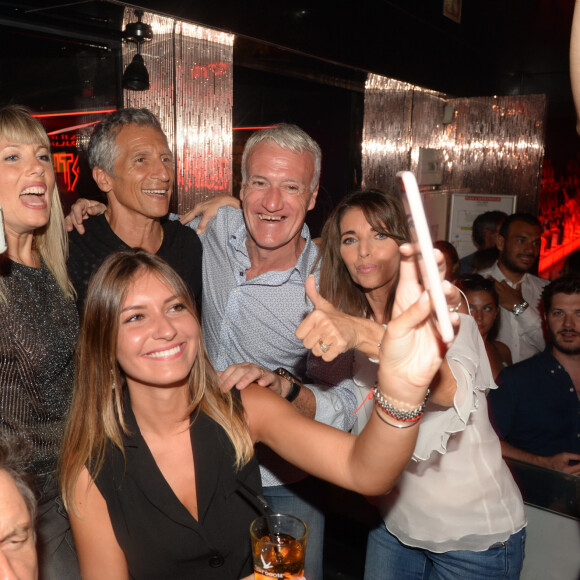 Didier Deschamps fête sa victoire avec sa femme Claude, Nagui et sa femme Mélanie Page et des amis à la Gioia et au VIP Room à Saint-Tropez, le 21 juillet 2018. © Rachid Bellak/Bestimage