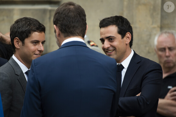 Christophe Castaner, ministre de l'Intérieur, Stephane Sejourne et Gabriel Attal lors du discours aux armées d'Emmanuel Macron à l'Hôtel de Brienne, siège du ministère des Armées. Emmanuel Macron a annoncé la création d'un commandement de l'espace, qui sera créé à l'automne au sein de l'armée de l'Air. Paris, le 13 juillet 2019. Eliot Blondet/Pool/Bestimage 