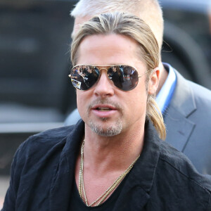Certains internautes ont émis l'hypothèse que ces nouveaux tatouages étaient en lien avec Brad Pitt
Brad Pitt et Angelina Jolie a l'arrivee pour l'avant-premiere du film "World War Z" a Paris le 03/06/2013 