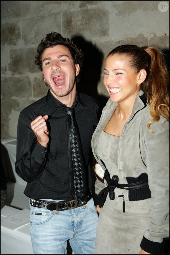 Michael Youn et Elsa Pataky - People - Défilé de mode Loew collection pret à porter printemps été 2005 à Paris.