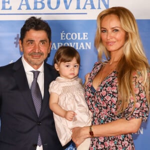Aram Ohanian, sa femme Adriana Karembeu et leur fille Nina Ohanian - Photocall de la soirée caritative organisée au Palais du Pharo, au profit de l'école arménienne Abovian. Marseille, le 26 octobre 2019.