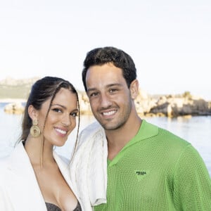 Iris Mittenaere et son compagnon Diego El Glaoui - Front row et people lors du défilé Etam Croisière 2022 au Domaine de Murtoli, Corse le 12 mai 2022. © Cyril Moreau / Bestimage 