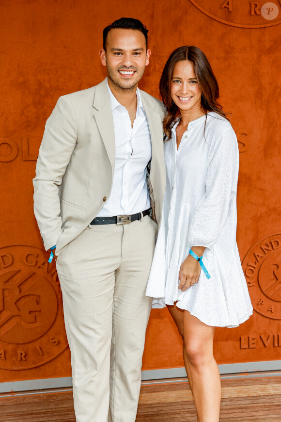 Mohamed Bouhafsi et sa compagne Angélique au village lors des Internationaux de France de tennis de Roland Garros 2023, à Paris, France, le 9 juin 2023. © Jacovides-Moreau/Bestimage 