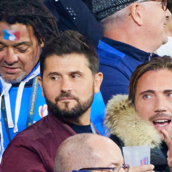 Maxim Nucci (Yodelice), Christophe Beaugrand et son mari Ghislain Gerin - People des les tribunes de la coupe du Monde de Rugby France 2023 - Match de quart de finale "France-Afrique du Sud (28-29)" au Stade de France à Saint-Denis 15 octobre 2023. © Moreau-Jacovides/Bestimage