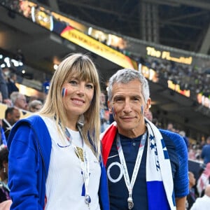 Nagui et sa femme Mélanie Page dans les tribunes du match "France - Argentine (3-3 - tab 2-4)" en finale de la Coupe du Monde 2022 au Qatar, le 18 décembre 2022. © Philippe Perusseau / Bestimage n