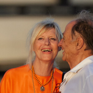 Exclusif - Chantal Ladesou et son mari Michel Ansault - People lors d'un évenement Saint-Laurent au port de Saint-Tropez le 20 juillet 2023. 