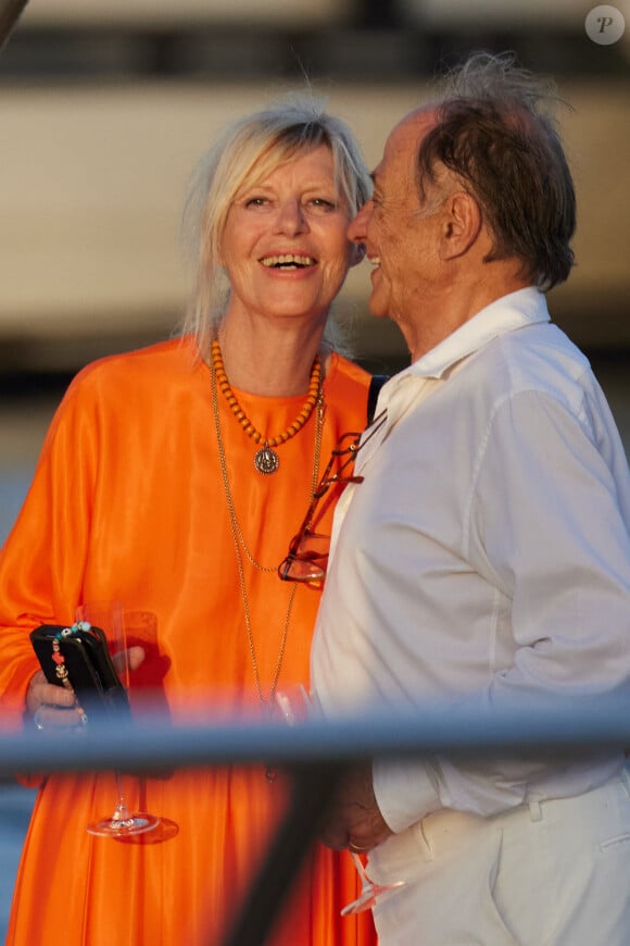 Exclusif - Chantal Ladesou et son mari Michel Ansault - People lors d'un évenement Saint-Laurent au port de Saint-Tropez le 20 juillet 2023. 