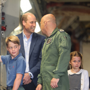 Le prince William, prince de Galles, et Catherine (Kate) Middleton, princesse de Galles, avec leurs enfants le prince George de Galles, et la princesse Charlotte de Galles, lors d'une visite au Royal International Air Tattoo (RIAT) à RAF Fairford, le 14 juillet 2023. 