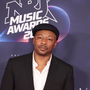 Mc Solaar au photocall de la 25ème cérémonie des "NRJ Music Awards (NMA)" au palais des Festivals et des Congrès de Cannes, France, le 10 novembre 2023. © Dominique Jacovides/Bestimage