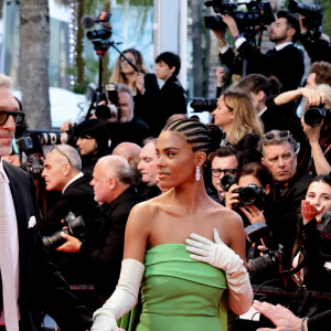 Tina Kunakey et Vincent Cassel - Montée des marches du film " Les crimes du futur " lors du 75ème Festival International du Film de Cannes. Le 23 mai 2022 © Dominique Jacovides / Bestimage 