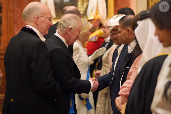 Le roi Charles III d'Angleterre et la reine consort Camilla lors d'une réception pour les corps diplomatiques au palais de Buckingham à Londres le 5 décembre 2023