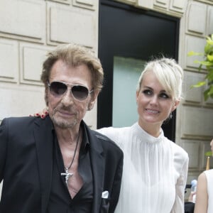 Johnny Hallyday et sa femme Laeticia Hallyday - People au défilé de mode Haute-Couture automne-hiver 2016/2017 "Christian Dior" à Paris. Le 4 juillet 2016 © Olivier Borde / Bestimage 