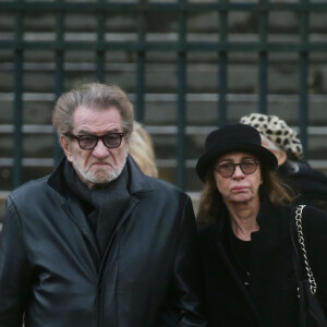 Eddy Mitchell et sa femme Muriel - Sorties de l'église de la Madeleine après les obsèques de Johnny Hallyday à Paris - Le 9 décembre 2017