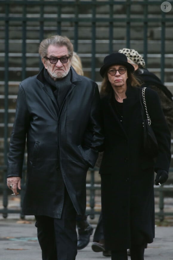 Eddy Mitchell et sa femme Muriel - Sorties de l'église de la Madeleine après les obsèques de Johnny Hallyday à Paris - Le 9 décembre 2017