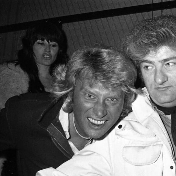 Archives - Johnny Hallyday, Eddy Mitchell et sa femme Muriel - Anniversaire de la creation du Golf Drouot. Beaucoup de debutants sont venus faire acte de presence pour remercier les fondateurs. Le 14 novembre 1980