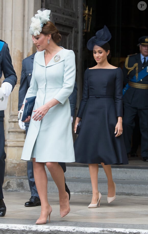 Kate Catherine Middleton, duchesse de Cambridge, Meghan Markle, duchesse de Sussex (habillée en Dior Haute Couture par Maria Grazia Chiuri) - La famille royale d'Angleterre à la sortie de l'abbaye de Westminster pour le centenaire de la RAF à Londres. Le 10 juillet 2018