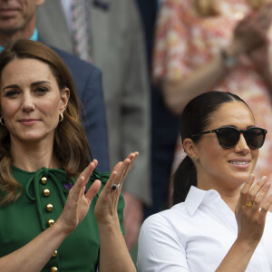 Catherine (Kate) Middleton, duchesse de Cambridge, Meghan Markle, duchesse de Sussex, et Pippa Middleton dans les tribunes lors de la finale femme de Wimbledon "Serena Williams - Simona Halep (2/6 - 2/6) à Londres, le 13 juillet 2019.