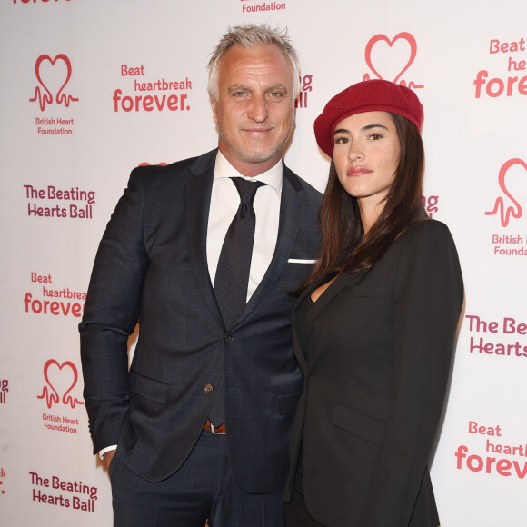 David Ginola et sa compagne Maeva Denat arrivent à la soirée "The Beating Hearts Ball" à Londres, le 27 février 2019. 