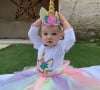 Ils étaient bien entendu accompagnés de leur petite fille Ever, née en 2018.
Maëva Denat publie une photo de sa fille à l'occasion de son premier anniversaire. Instagram, le 22 février 2019.