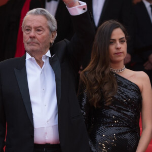 Alain Delon et sa fille Anouchka (Robe Elie Saab) - Montée des marches du film "A Hidden Life" lors du 72ème Festival International du Film de Cannes, le 19 mai 2019.