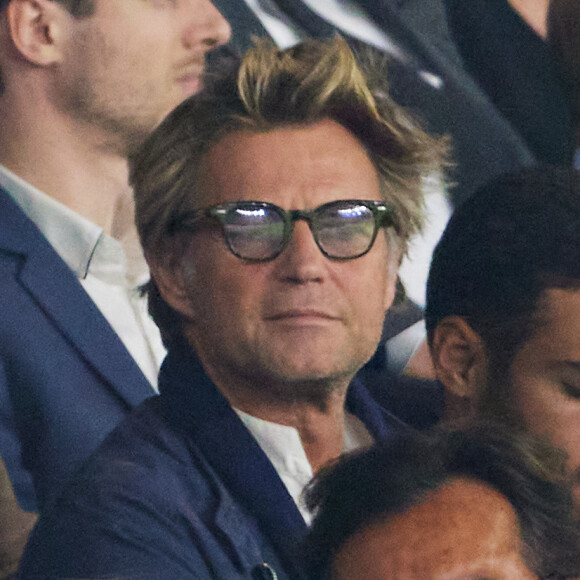 Laurent Delahousse - People dans les tribunes du match de Ligue des champions entre le PSG et le Borussia Dortmund (2-0) au Parc des Princes à Paris le 19 septembre 2023. © Cyril Moreau/Bestimage