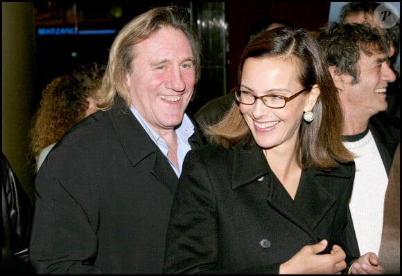 Gérard Depardieu & Carole Bouquet a l'avant premiere du film ' 36 quai des Orfevres ' au cinema Pathe Wepler.