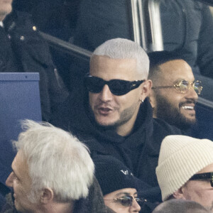 Eve Gilles, Miss France 2024, DJ Snake et Malik Bentalha - Celébrités dans les tribunes du match de Ligue 1 Uber Eats "PSG-Brest" (2-2) au Parc des Princes à Paris le 28 janvier 2024. © Cyril Moreau/Bestimage