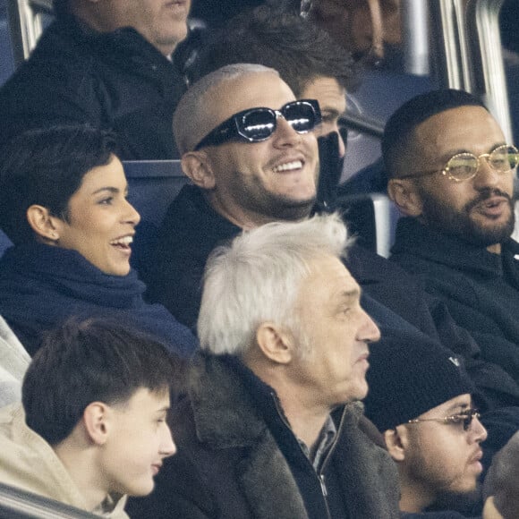 Eve Gilles, Miss France 2024, DJ Snake et Malik Bentalha - Celébrités dans les tribunes du match de Ligue 1 Uber Eats "PSG-Brest" (2-2) au Parc des Princes à Paris le 28 janvier 2024. © Cyril Moreau/Bestimage