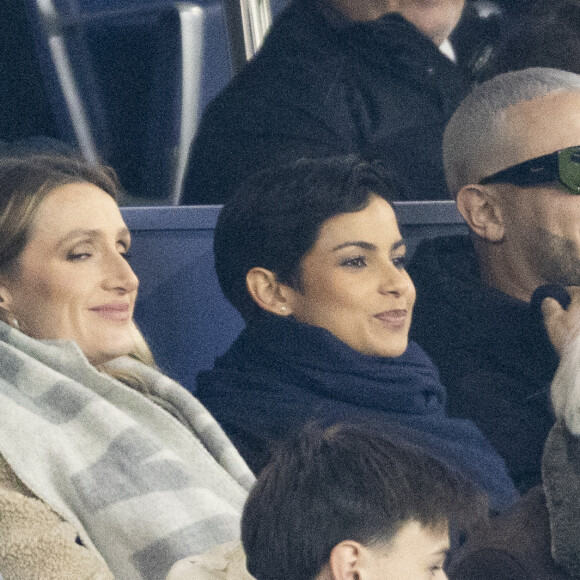 Eve Gilles, Miss France 2024, DJ Snake et Malik Bentalha - Celébrités dans les tribunes du match de Ligue 1 Uber Eats "PSG-Brest" (2-2) au Parc des Princes à Paris le 28 janvier 2024. © Cyril Moreau/Bestimage