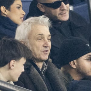 Eve Gilles, Miss France 2024, DJ Snake et Malik Bentalha - Celébrités dans les tribunes du match de Ligue 1 Uber Eats "PSG-Brest" (2-2) au Parc des Princes à Paris le 28 janvier 2024. © Cyril Moreau/Bestimage