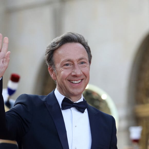 "40 ans et 60 ans, je ne vois pas trop, à part qu'il commence à avoir mal au dos !", a-t-il souligné en rigolant.
Stéphane Bern - Dîner d'Etat au château de Versailles en l'honneur de la visite officielle du roi et de la reine d'Angleterre en France (20 - 22 septembre 2023). © Stéphane Lemouton / Bestimage