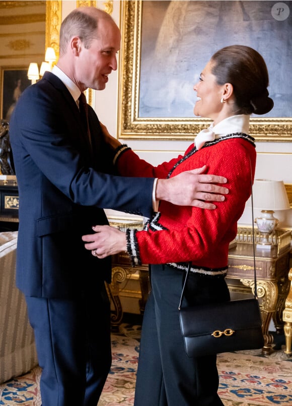 La princesse Victoria et le prince Daniel de Suède reçus par Le prince William, prince de Galles, et Catherine (Kate) Middleton, princesse de Galles, au château de Windsor, le 30 novembre 2023.