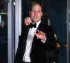 Dans un très élégant smoking noir.
Le prince William, collecte de fonds pour l'association caritative London Air Ambulance. Photo Doug Peters / abaca