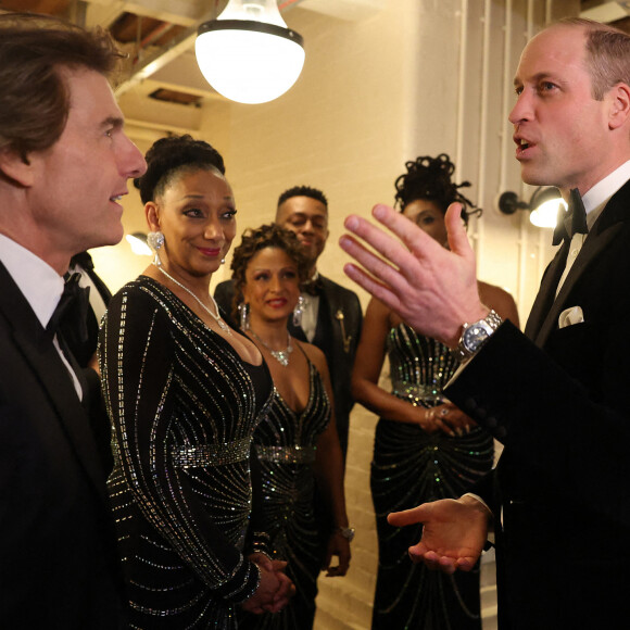 Il était entouré de Tom Cruise.
Le prince William et Tom Cruise, collecte de fonds pour l'association caritative London Air Ambulance. Photo Daniel Leal/PA Wire. 