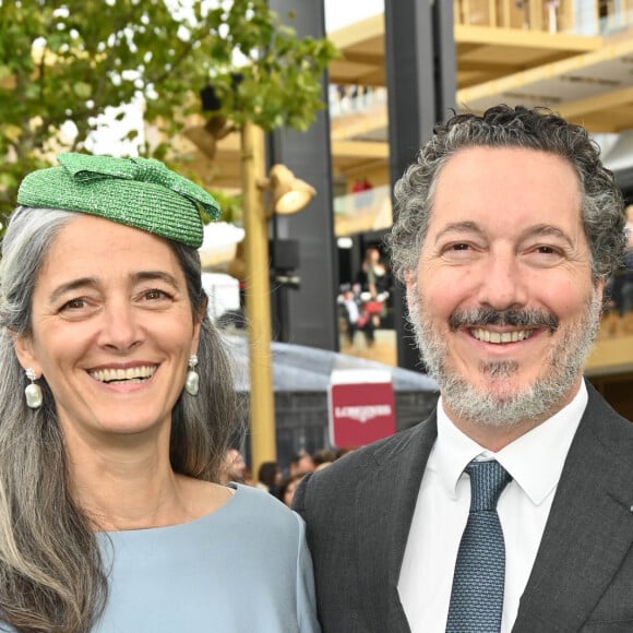 Très pris par ses divers projets artistiques, Guillaume Gallienne a adapté sa pièce Les garçons et Guillaume, à table ! au cinéma 
Guillaume Gallienne avec sa femme Amandine - Qatar Prix de l'Arc de Triomphe à l'hippodrome Paris Longchamp le 2 octobre 2022. © Coadic Guirec/Bestimage/Bestimage