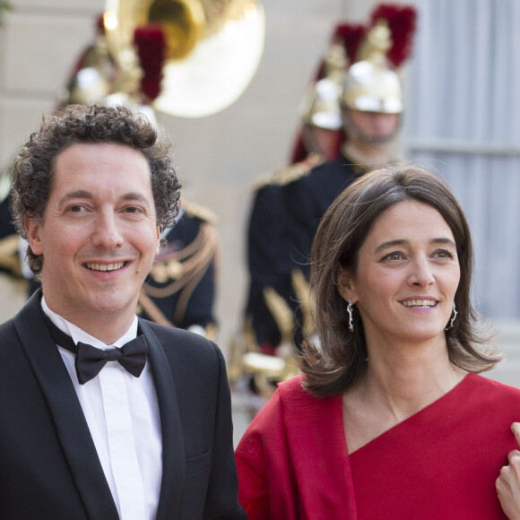 "Je me réveille vers 8 heures, car j'aime consacrer au moins une demi-heure à mon fils. J'aime surtout prendre mon petit déjeuner avec lui"
Guillaume Gallienne et sa femme Amandine - Dîner d'état en l'honneur de la reine d'Angleterre donné par le président français au palais de l'Elysée à Paris, le 6 juin 2014