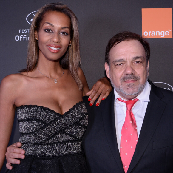 L'occasion de faire une rétrospection sur la vie privée de l'acteur.
Didier Bourdon et sa femme Marie-Sandra Badini au photocall de la soirée "Orange" sur la plage de l'hôtel Majectic lors du 72ème Festival International du Film de Cannes, le 18 mai 2019. © Rachid Bellak/Bestimage 
