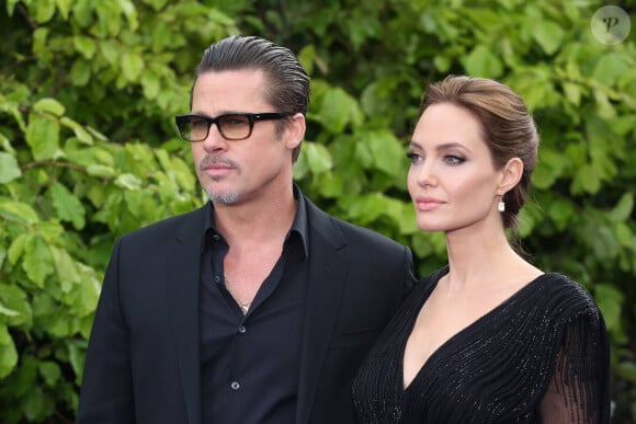 Angelina Jolie drops a new bomb on Brad Pitt.  Brad Pitt, Angelina Jolie - Film premiere "Maleficent" in London.
