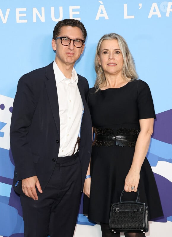 Maxime Saada et sa femme Sylvie - Avant-première de la série "Terminal" au cinéma Max Linder à Paris, le 8 avril 2024. © Coadic Guirec/Bestimage