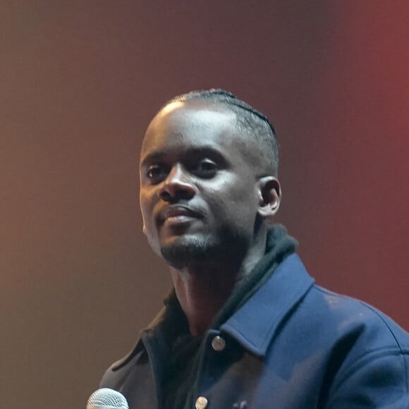 "Trop triste", peut-on lire sur X.
Le chanteur Black M sur la scène du Rugby Music Live, concert NRJ, une rencontre d'artistes et de sportifs devant 8000 spectateurs qui ont fait un don pour 3 associations à Lyon, le 13/05/2023. © Sandrine Thesillat / Panoramic / Bestimage