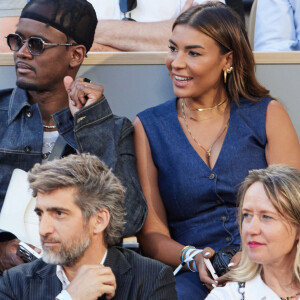 "C'était une bête d'aventure. Merci la DALS family" peut-on lire en légende.
Black M et sa compagne Léa Djadja en tribunes lors des Internationaux de France de tennis de Roland Garros 2023, à Paris, France, le 6 juin 2023. © Jacovides-Moreau/Bestimage