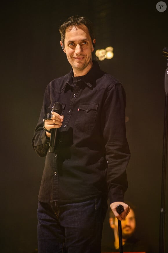 Le chanteur français Grand Corps Malade chante en direct à Forest National Bruxelles, Belgique, le 14 janvier 2024. Photo par Jean-Marc Quinet/Content Curation/ABACAPRESS.COM