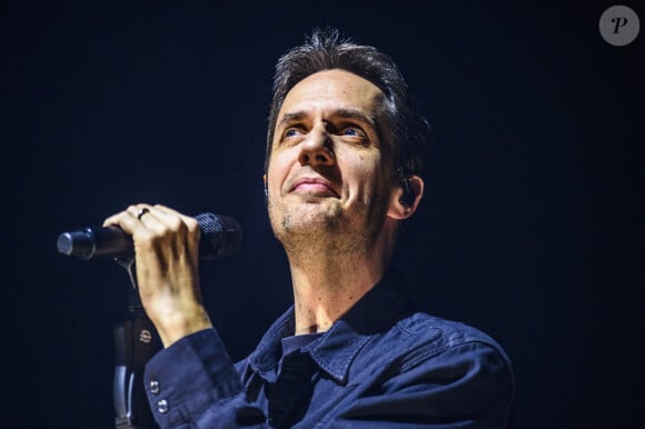 Le chanteur français Grand Corps Malade chante en direct à Forest National Bruxelles, Belgique, le 14 janvier 2024. Photo par Jean-Marc Quinet/Content Curation/ABACAPRESS.COM