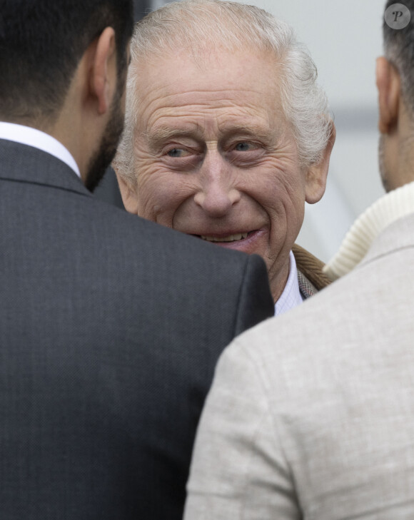 Le roi Charles III d'Angleterre, et Z.Phillips (Z.Tindall), assistent au concours hippique Royal Windsor Horse Show à Windsor, le 3 mai 2024.