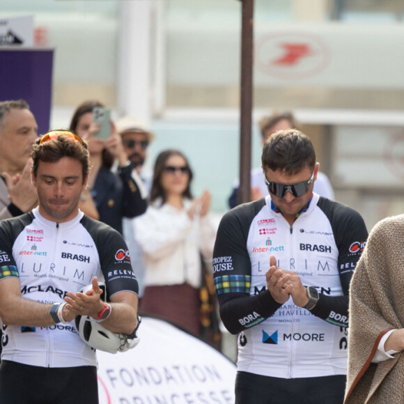 La princesse Charlène de Monaco assiste à l'arrivée de la 10ème édition de la randonnée cycliste caritative St Tropez à Monaco organisée par le COCC (Champagne & Oyster Cycling Club of Monaco) au profit de la Princesse Charlène de Monaco le 5 mai 2024. © Olivier Huitel / Pool Monaco / Bestimage 