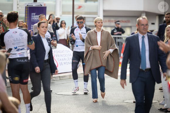 La princesse Charlène de Monaco assiste à l'arrivée de la 10ème édition de la randonnée cycliste caritative St Tropez à Monaco organisée par le COCC (Champagne & Oyster Cycling Club of Monaco) au profit de la Princesse Charlène de Monaco le 5 mai 2024. © Olivier Huitel / Pool Monaco / Bestimage