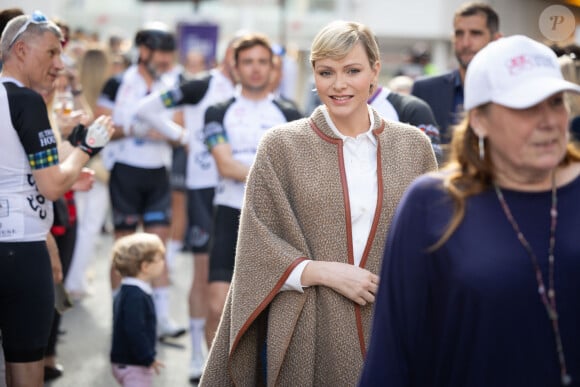 La princesse Charlène de Monaco assiste à l'arrivée de la 10ème édition de la randonnée cycliste caritative St Tropez à Monaco organisée par le COCC (Champagne & Oyster Cycling Club of Monaco) au profit de la Princesse Charlène de Monaco le 5 mai 2024. © Olivier Huitel / Pool Monaco / Bestimage