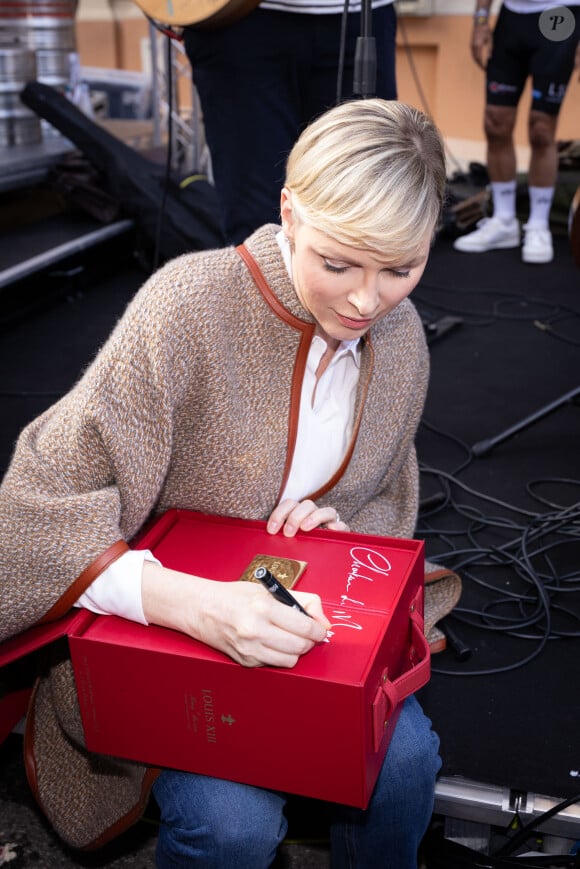 La princesse Charlène de Monaco assiste à l'arrivée de la 10ème édition de la randonnée cycliste caritative St Tropez à Monaco organisée par le COCC (Champagne & Oyster Cycling Club of Monaco) au profit de la Princesse Charlène de Monaco le 5 mai 2024. © Olivier Huitel / Pool Monaco / Bestimage