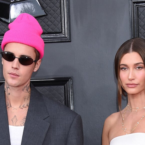 Le couple, qui s'est marié en 2018, a dévoilé une courte vidéo de leur renouvellement de voeux à Hawaï sur Instagram dans laquelle on découvre le joli ventre rond de la jeune femme
Justin Bieber et Hailey Rhode Bieber (Baldwin) au photocall de la 64ème édition des Grammy Awards au MGM Grand Garden à Las Vegas le 3 avril 2022. 