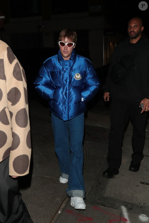 Justin Bieber et sa femme Hailey à l'afterparty "Moncler" lors de la Fashion Week de Londres (LFW) au Chiltern Firehouse à Londres, le 20 février 2023. 